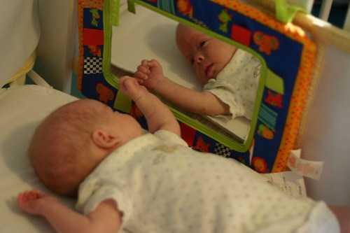Miles and the baby in the mirror