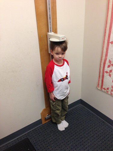 Miles getting height measured